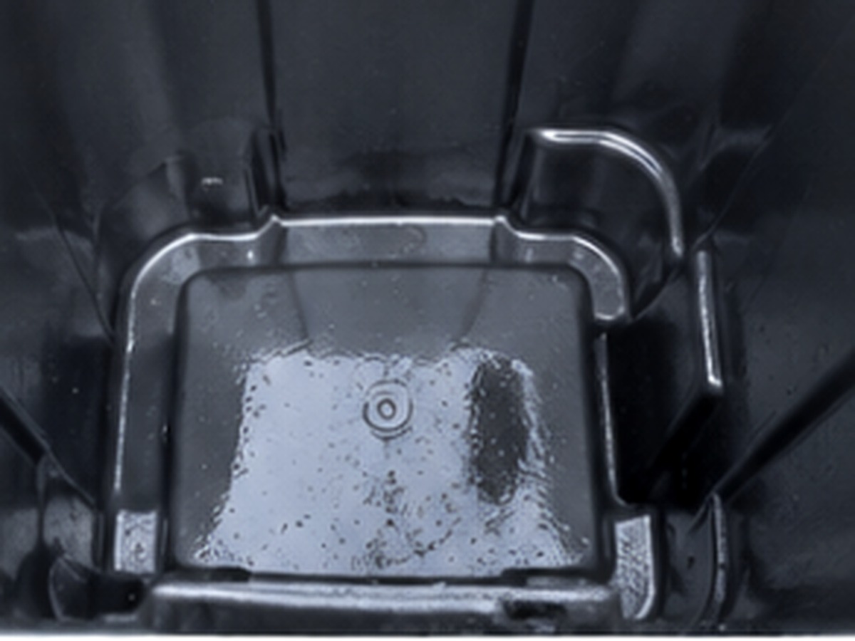 Inside of a residential trash bin after FreshBin pressure washing — clean and odor free